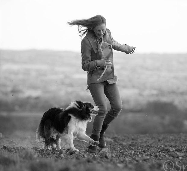 lady walking with dog